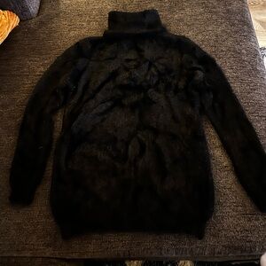 black turtleneck fuzzy sweater